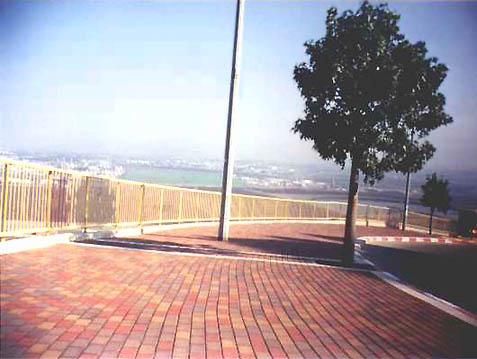 The sand of waterless suburbs, Mingling with wind and birds' cries, / Mixing with dust of the earth, / Rises up to the skies